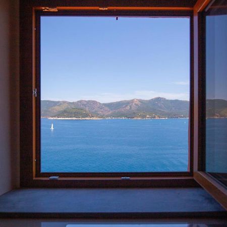 Helloelba Appartamento Il Faro ポルトフェッラーイオ エクステリア 写真