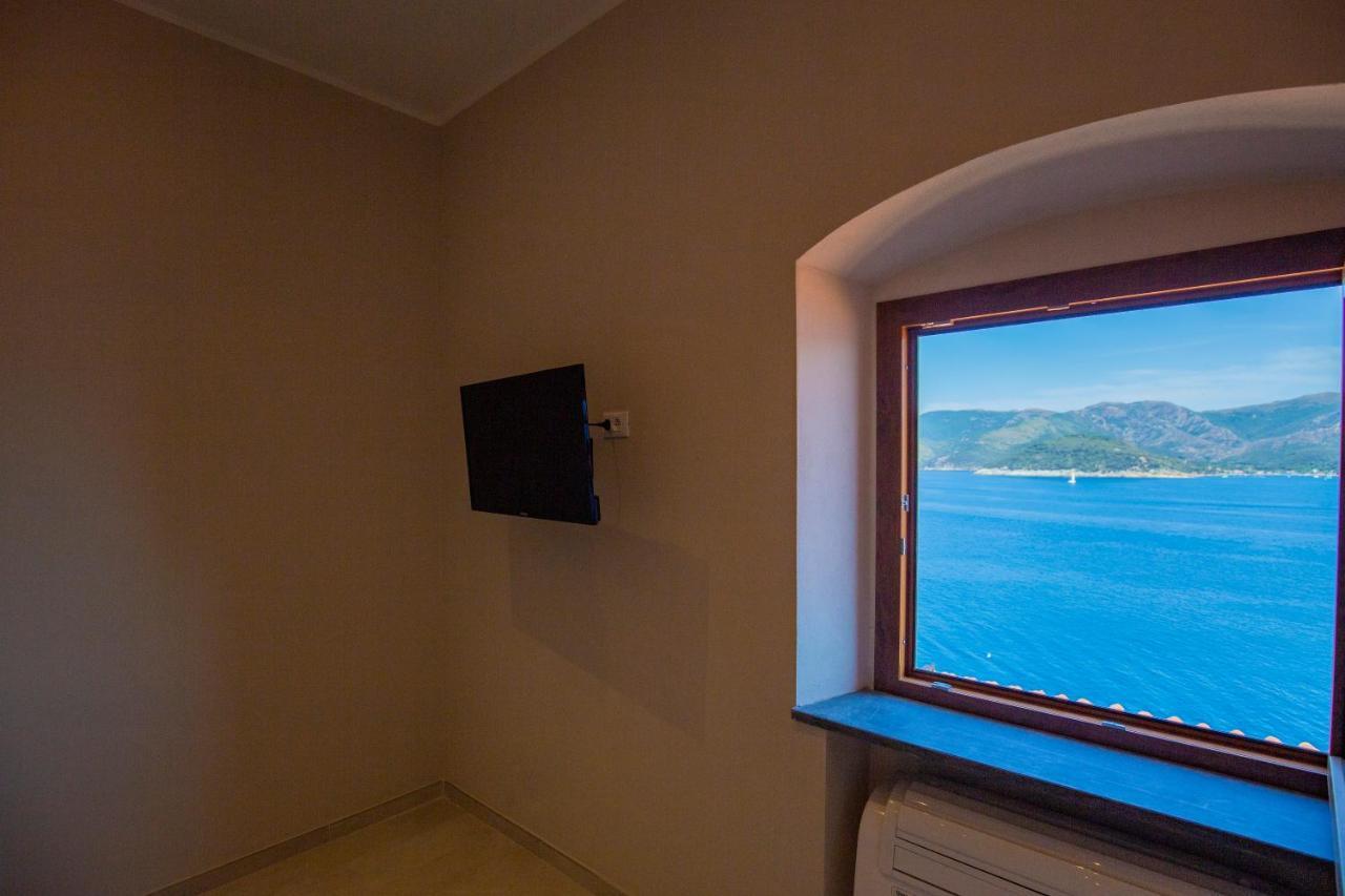 Helloelba Appartamento Il Faro ポルトフェッラーイオ エクステリア 写真